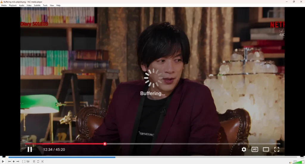 Screenshot of VLC Media Player experiencing a buffering issue while playing an M3U playlist stream.